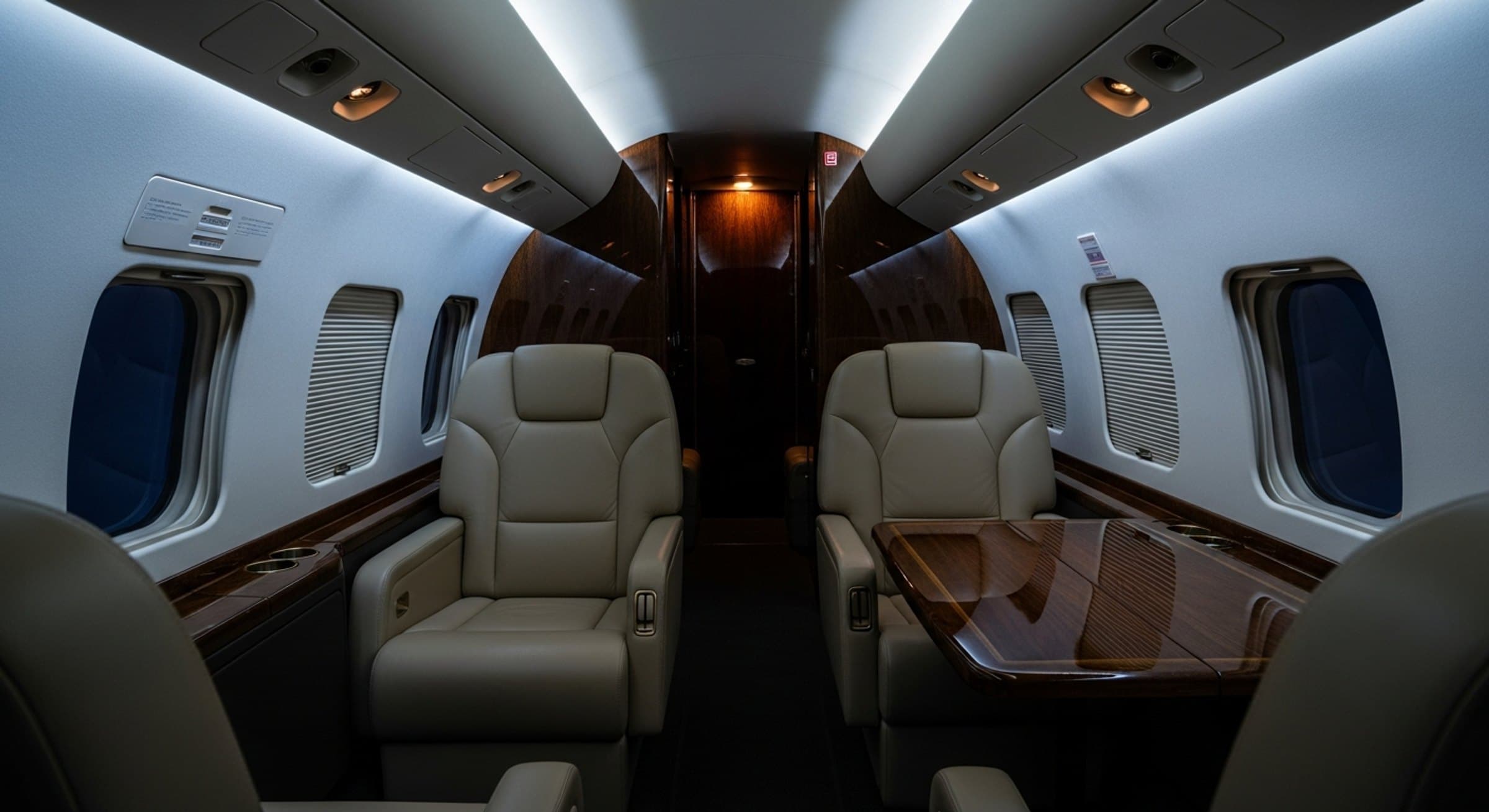 Executive cabin of a business jet in low light
